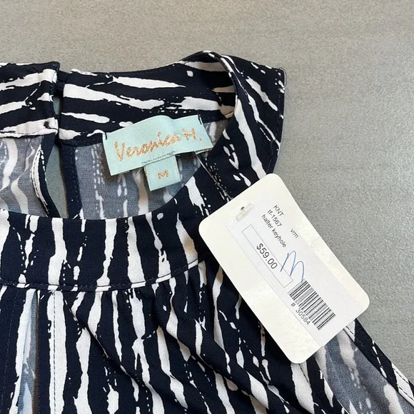 NEVER WORN. Medium going out halter top. - Picture 3 of 5